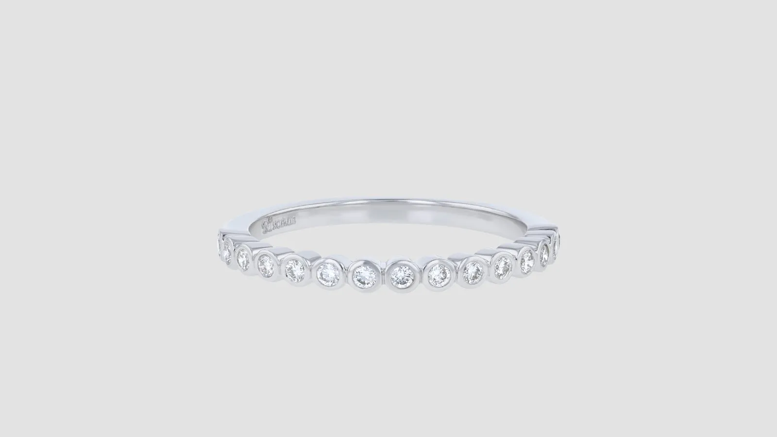The Half Band Bezel Diamond Ring
